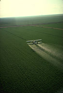 Cropduster spraying pesticides.jpg